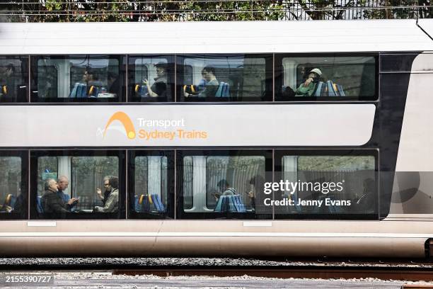 Passengers are seen on a train between Central and Redfern stations on May 31, 2024 in Sydney, Australia. Sydney's rail network is undergoing a huge...