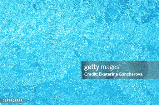 Bright blue abstract texture. Bubbling water pattern creating a dynamic and vibrant visual. High-resolution image ideal for aquatic themes. Bright blue abstract texture. Bubbling water pattern creating a dynamic and vibrant visual. High-resolution image ideal for aquatic themes.