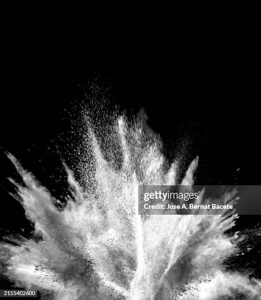 multiple explosions of smoke and dust in upward motion on a black background. - explosive stock pictures, royalty-free photos & images