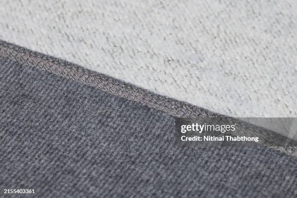background image of fabric pattern - pantalón gris fotografías e imágenes de stock