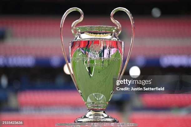 Detailed view of the UEFA Champions League trophy is seen on a plinth prior to the UEFA Champions League 2023/24 final match between Borussia...