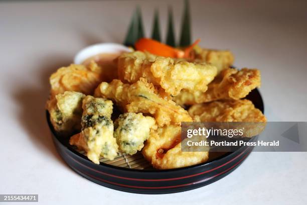 Thai Tree's Vegetable Tempura with sweet potato, onion, broccoli, pumpkin, mushrooms, carrots, and served with sweet-chili mayonnaise.