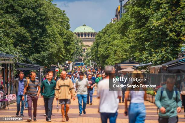 crowded street in sofia, the capital city of bulgaria - demografie stockfoto's en -beelden