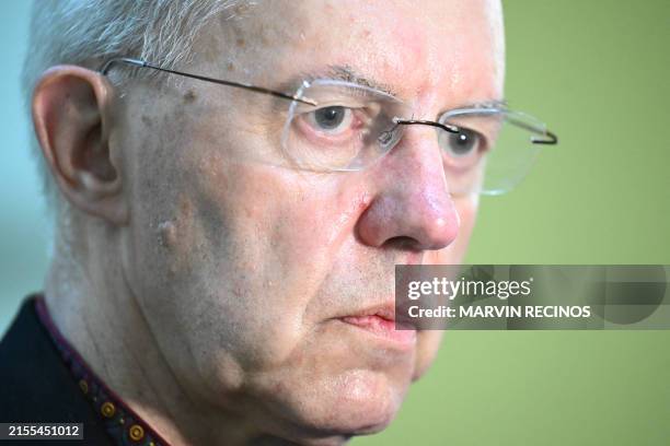 Archbishop of Canterbury Justin Welby visits the tomb of Oscar Arnulfo Romero in San Salvador on June 4, 2024. The leader of the Anglican Church and...