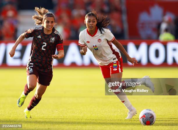 Jayde Riviere of Canada battles for the ball with Kenti Robles of Mexico during an International Friendly match at BMO Field on June 4, 2024 in...