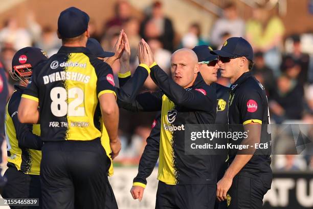 Callum Parkinson of Durham celebrates taking a wicket during the T20 Vitality Blast match between Durham Cricket and Bears at Seat Unique Riverside...