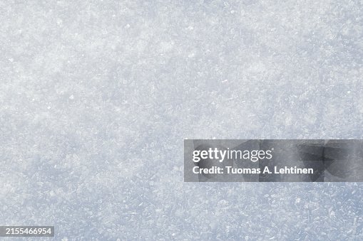 Close-up of fresh and bright snowy land in the winter, viewed from above. Close-up of fresh and bright snowy land in the winter, viewed from above.