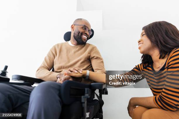 supportive relationship - multiple sclerosis stock pictures, royalty-free photos & images