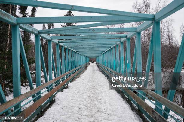 View of a bridge at Campbell Creek Trail park as daily life continues in Anchorage, Alaska, United States on April 22, 2024.