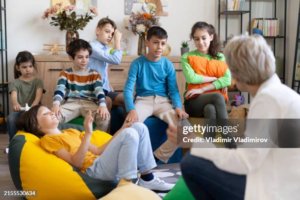 teacher leading session with children - group of people using sign language stock pictures, royalty-free photos & images