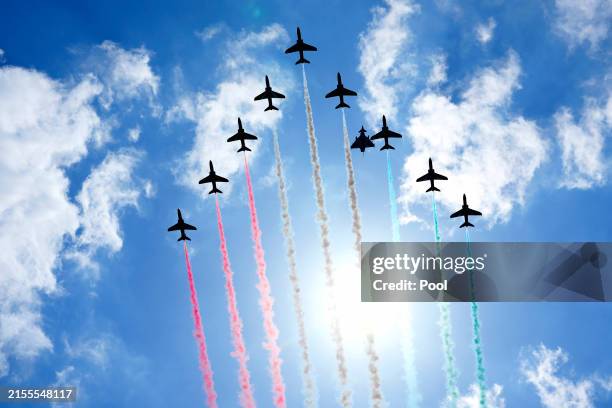 The RAF Red Arrows display team performs during the UK's national commemorative event for the 80th anniversary of D-Day, hosted by the Ministry of...