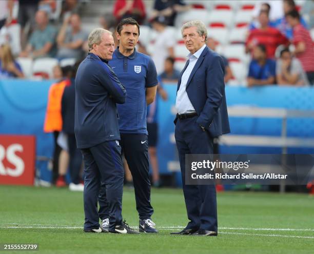 June 27: Ray Lewington and Gary Neville of England with Roy Hodgson Manager of England before the UEFA Euro 2016 Round Of 16 match between England...