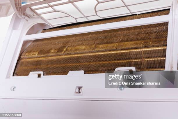 cleaning and maintenance of air conditioner, evaporator coil. - evaporator coil stock pictures, royalty-free photos & images