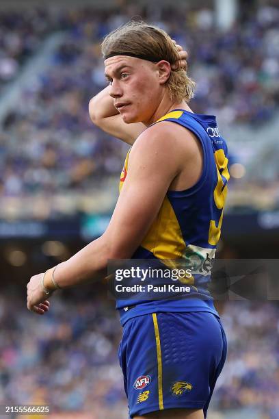 Harley Reid of the Eagles looks on after giving away a free kick with a heavy tackle on Darcy Wilson of the Saints during the round 12 AFL match...