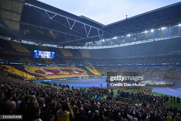 General view inside the stadium as players of Borussia Dortmund and Real Madrid line up, as fans of Borussia Dortmund form a Tifo, prior to the UEFA...