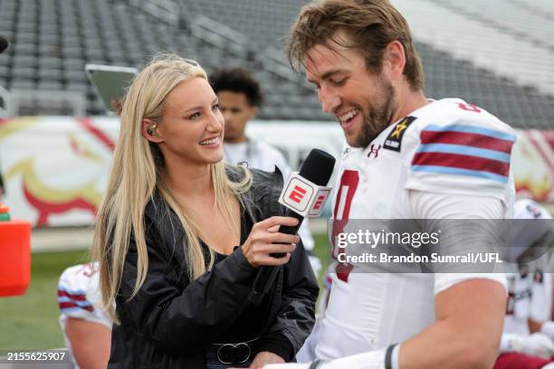 Sideline reporter Stormy Buonantony interviews Danny Etling of the Michigan Panthers after his rushing touchdown against the Birmingham Stallions...