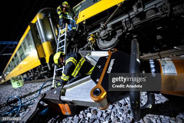 At least four people are killed and 20 injured in a train crash in Pardubice, Czech Republic, on June 06, 2024. The accident occurred late at night...