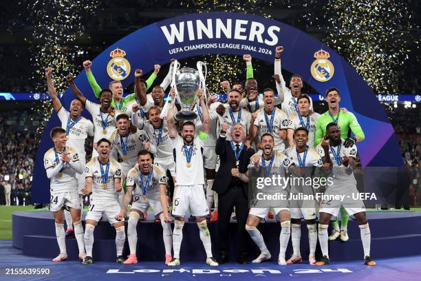 Nacho Fernandez of Real Madrid lifts the UEFA Champions League Trophy after his team's victory during the UEFA Champions League 2023/24 Final match...