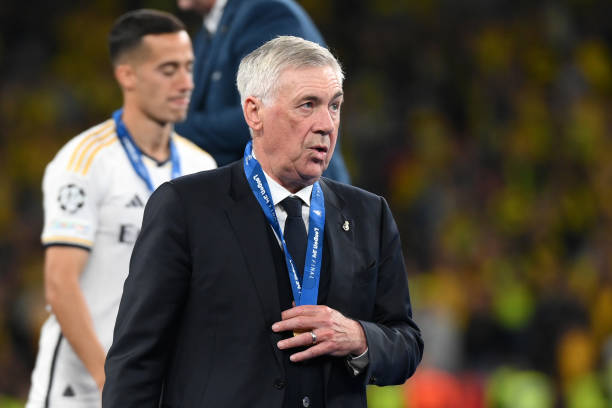 Carlo Ancelotti, Head Coach of Real Madrid, looks on after collecting his winners medal after Real Madrid defeat Borussia Dortmund during the UEFA...