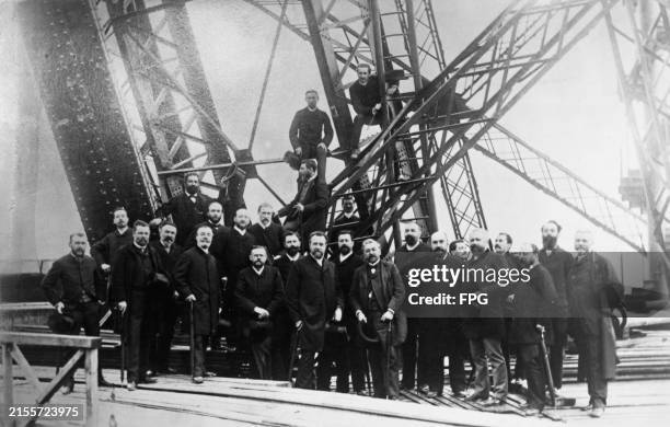 French civil engineer Gustave Eiffel among members of the Societe Centrale des Architects on the first-floor landing of the Eiffel Tower, during an...