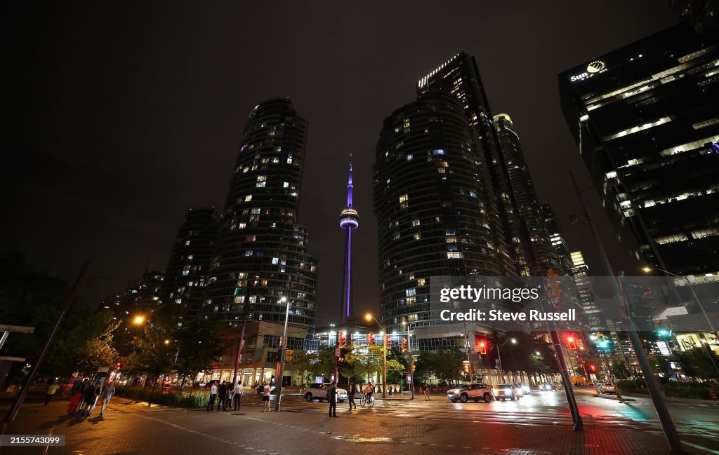 The CN Tower at night shines purple to draw attention to Spinal CSF Leak Awareness Week and Hidradenitis Suppurativa (HS) Awareness Week