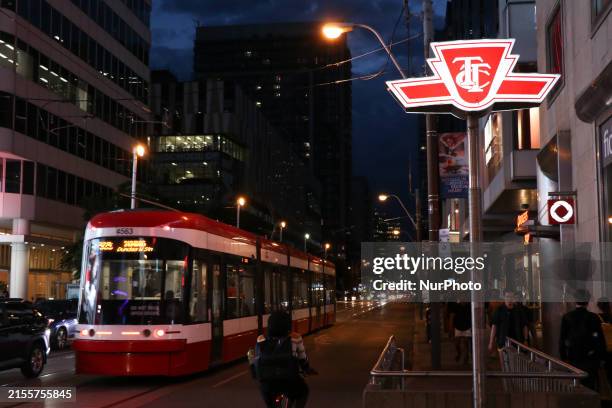 Toronto Transit Commission logo is standing outside the Bloor-Yonge subway station in Toronto, Canada, on June 06, 2024.