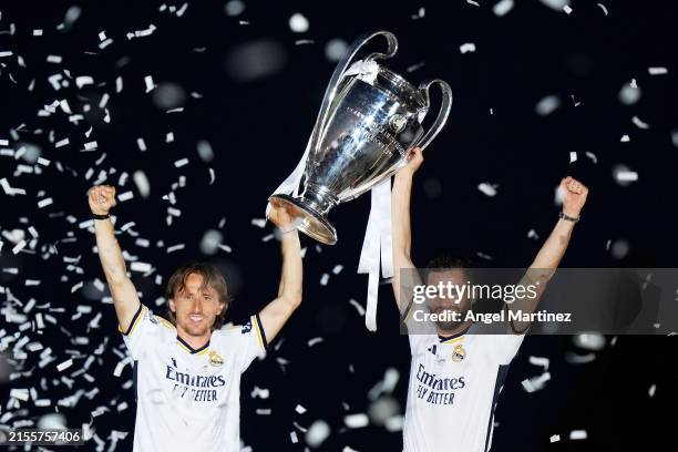 Luka Modric and Nacho Fernandez of Real Madrid celebrate with the UEFA Champions League trophy during the Real Madrid UEFA Champions League Trophy...