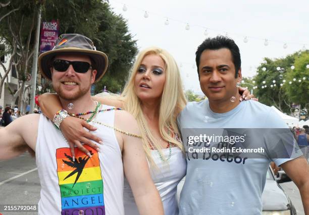 Abbie Cornish dressed as Anna Nicole Smith and Kal Penn representing Project Angel Food attend the 2024 WeHo Pride Parade on June 02, 2024 in West...