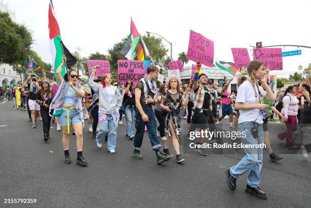 Palestinian activists at the 2024 WeHo Pride Parade on June 02, 2024 in West Hollywood, California.