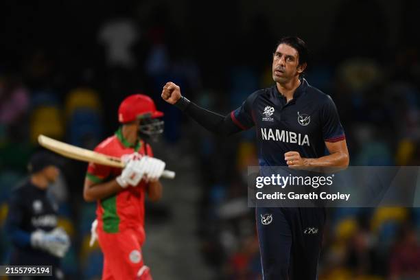 David Wiese of Namibia celebrates winning the super over and the ICC Men's T20 Cricket World Cup West Indies & USA 2024 match between Namibia and...