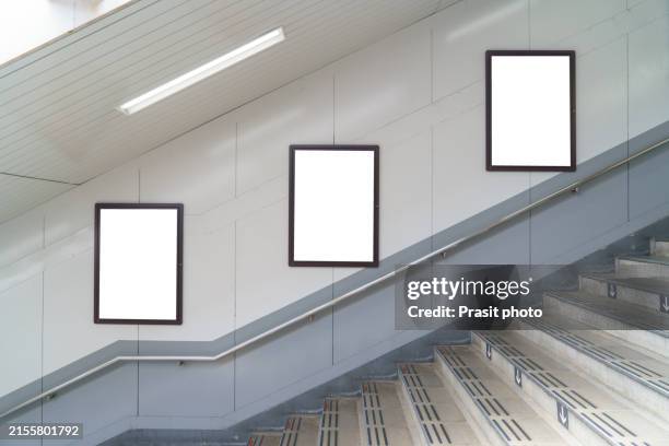 blank billboard on subway station - subway platform poster stock pictures, royalty-free photos & images