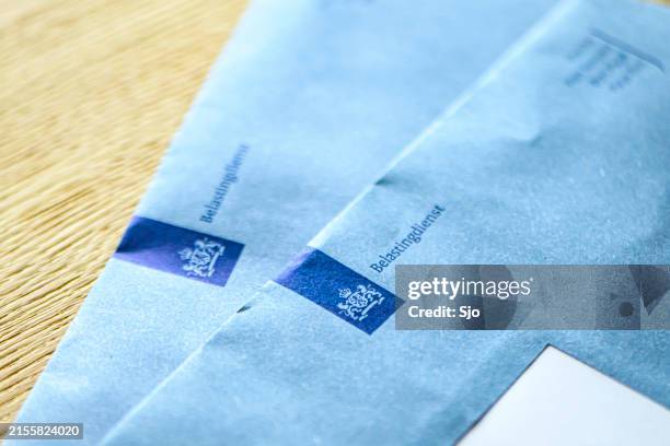 dutch tax envelope of the netherlands tax office belastingdient - tax stock pictures, royalty-free photos & images