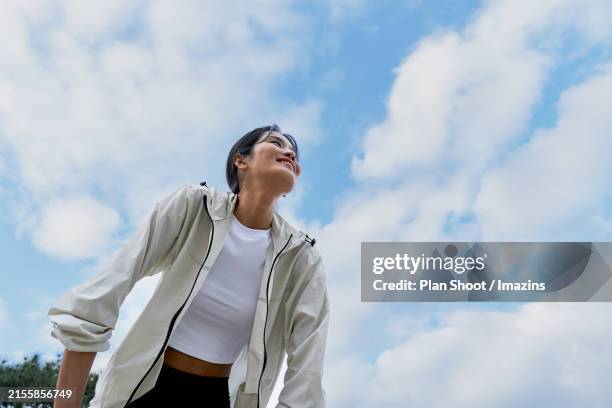 woman smiling brightly - respiration stock pictures, royalty-free photos & images