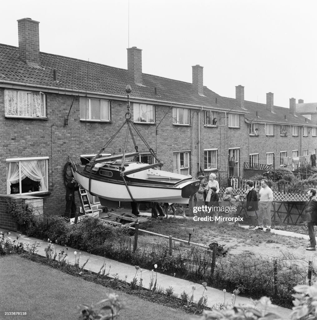 Boat swung over house after construction