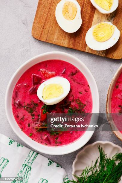 polish summer vegetable soup made from beet tops with boiled egg botwinka - borscht stock pictures, royalty-free photos & images