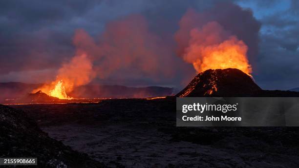 Lava flows from multiple craters of the Sundhnúkur volcano on June 2, 2024 on the Reykjanes peninsula near Grindavik, Iceland. The volcano, which has...