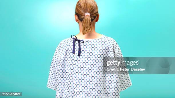 women waitind dressed for hospital procedure - female patient hospital gown stock pictures, royalty-free photos & images