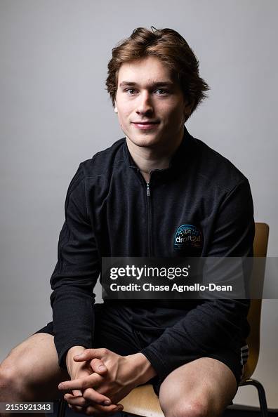 Macklin Celebrini poses for a portrait during the 2024 NHL Scouting ...