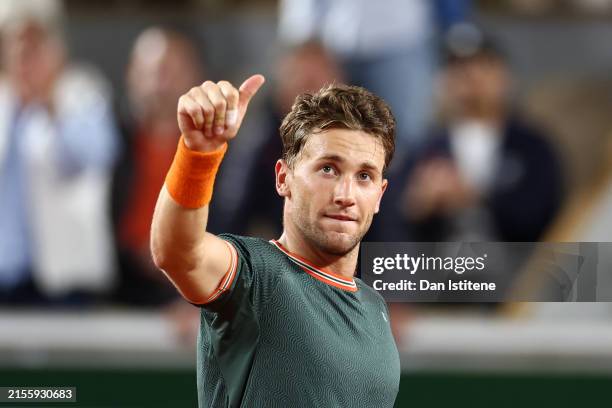 Casper Ruud of Denmark celebrates winning match point against Taylor Fritz of United States in the Men's Singles fourth round match during Day Nine...