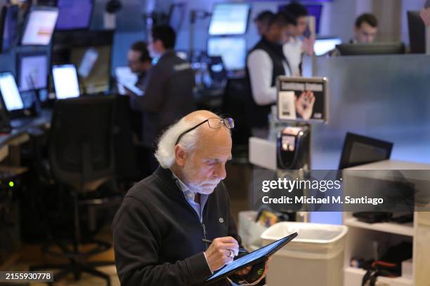 Stock trader Peter Tuchman works on the floor of the New York Stock Exchange during afternoon trading on June 03, 2024 in New York City. Stocks...