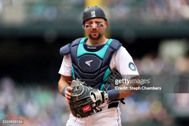 Cal Raleigh of the Seattle Mariners looks on during the game against the Houston Astros at T-Mobile Park on May 30, 2024 in Seattle, Washington.