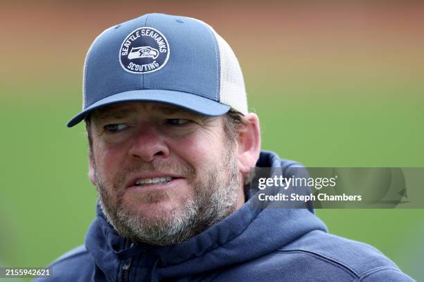 General manager and president of football operations John Schneider of the Seattle Seahawks looks on during practice at Virginia Mason Athletic...