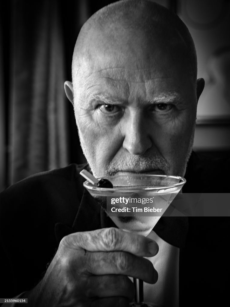 Man in tuxedo with martini.