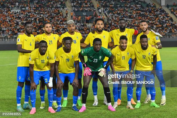 Gabon players pose for a team photo during the FIFA World Cup 2026 Africa qualifiers group F football match between Ivory Coast and Gabon at the...