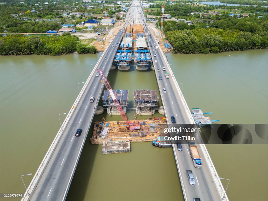 Construction In Rivers Aerial View Of Bridge Construction Over River In Urban Area High-Res ...