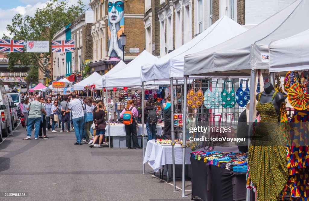 London people browsing Portobello Road market stalls Notting Hill