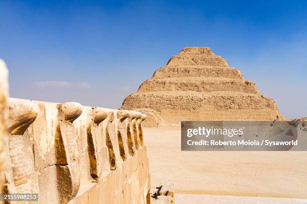 cobra wall sculptures, step pyramid of djoser - saqqara stock pictures, royalty-free photos & images