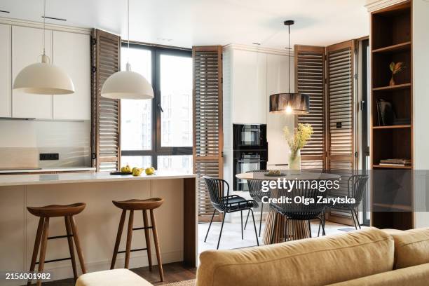 modern interior design of kitchen and part of living room. - shutter stock pictures, royalty-free photos & images