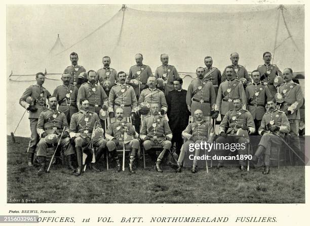 military history, victorian british army soldiers, officers 1st volunteer battalion northumberland fusiliers, 1890s, 19th century vintage photograph - chaplain stock illustrations