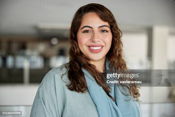 smiling female student with wavy hair - arabic style stock pictures, royalty-free photos & images